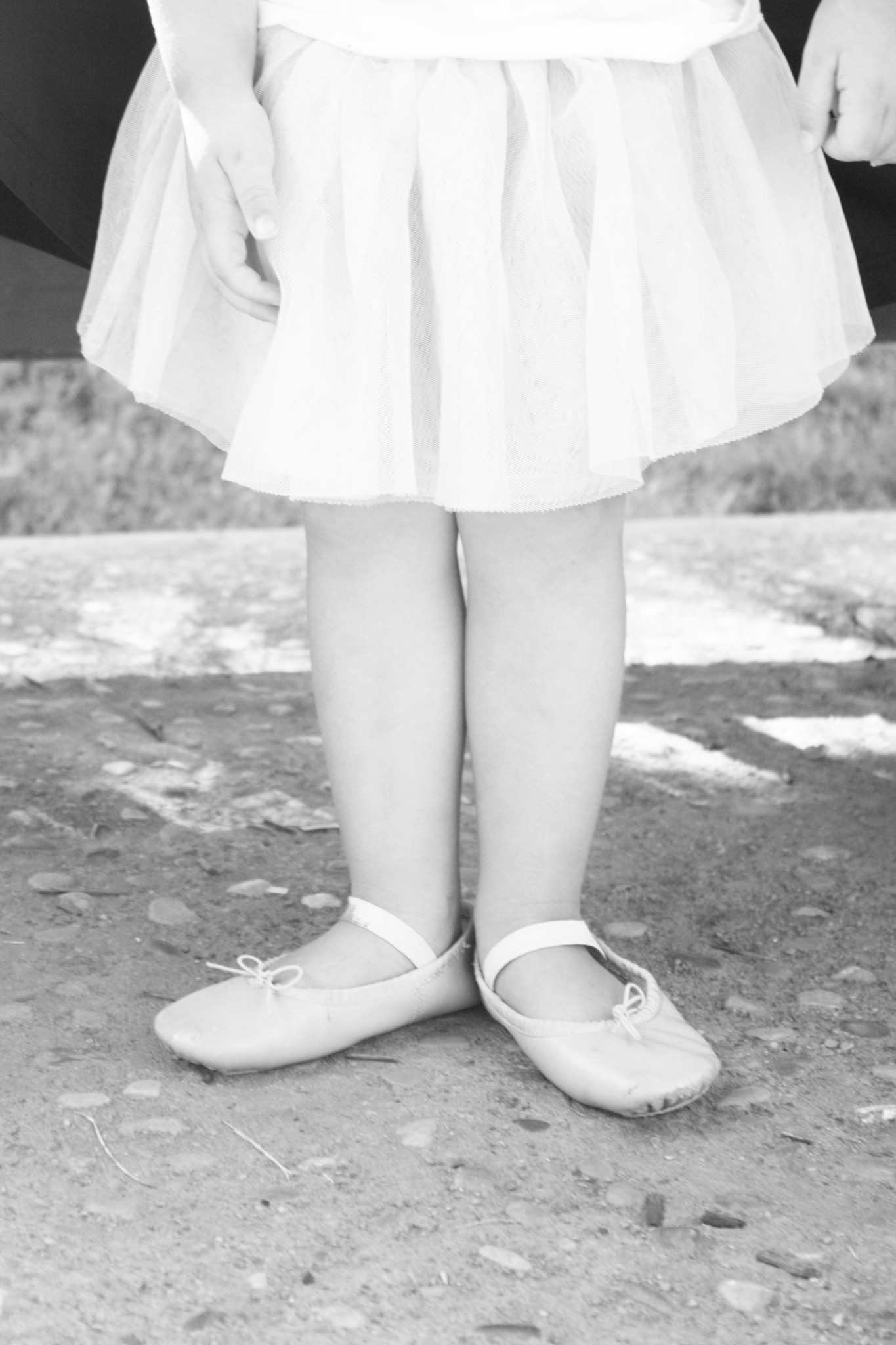 Young dancer wearing a tutu and ballet slippers